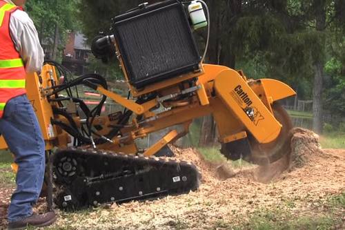 Stump grinder removing a tree stump in Jefferson County, Kentucky